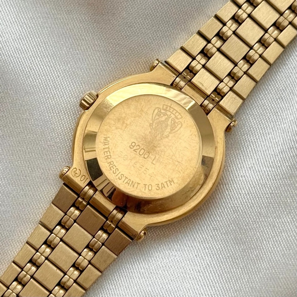 AUTHENTIC VINTAGE GUCCI DIAMOND CUT BEZEL GOLD WATCH - Picture 5 of 5